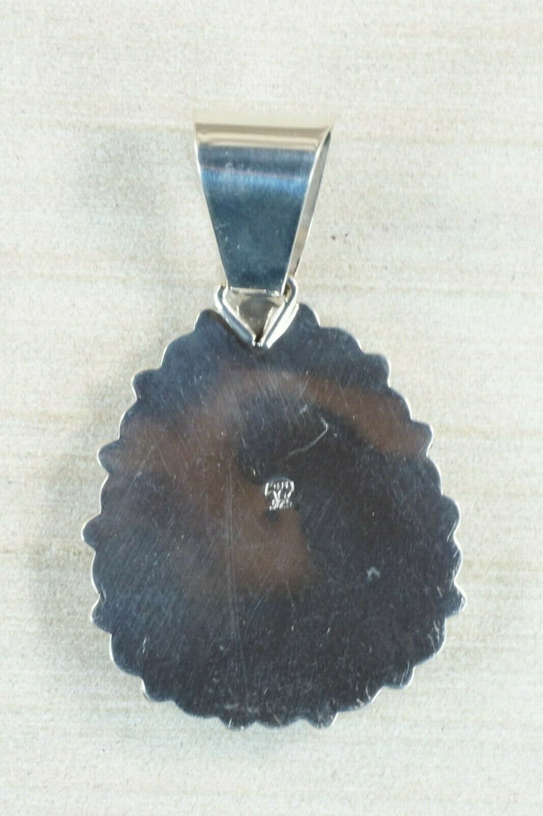 Navajo Lapis and Sterling Silver Pendant - Raymond Delgarito