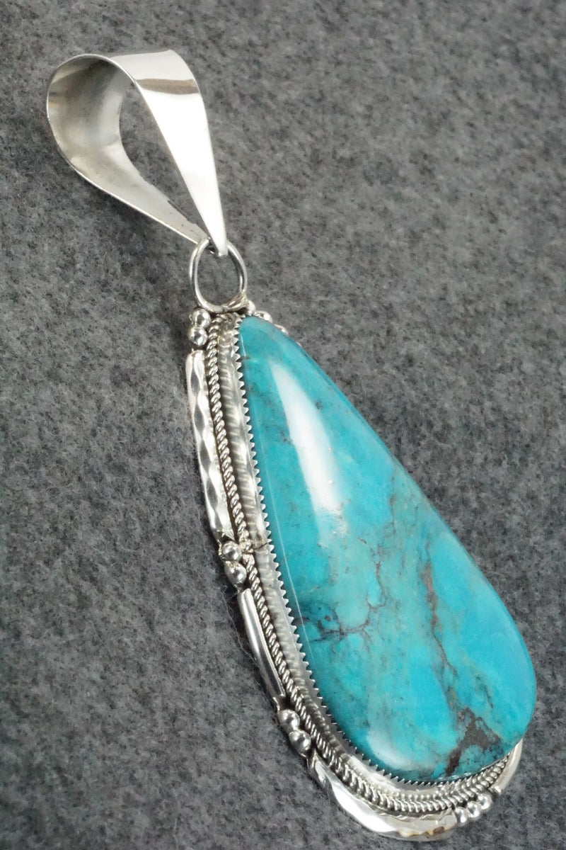 Turquoise and Sterling Silver Pendant - Kenny Calavaza