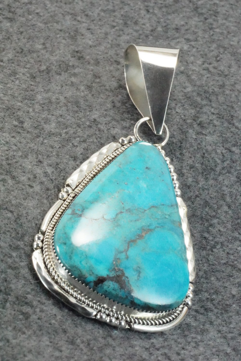 Turquoise and Sterling Silver Pendant - Kenny Calavaza