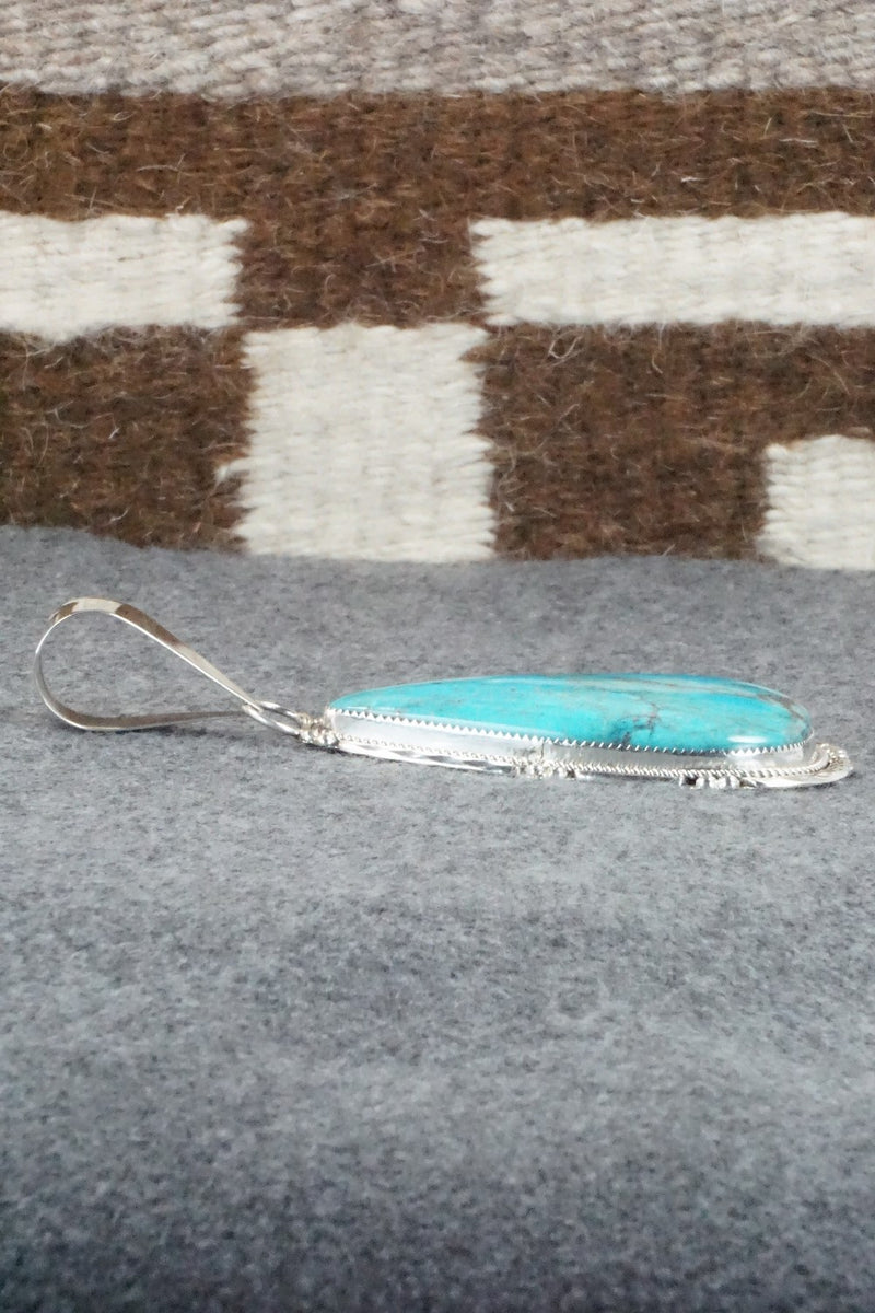 Turquoise and Sterling Silver Pendant - Kenny Calavaza