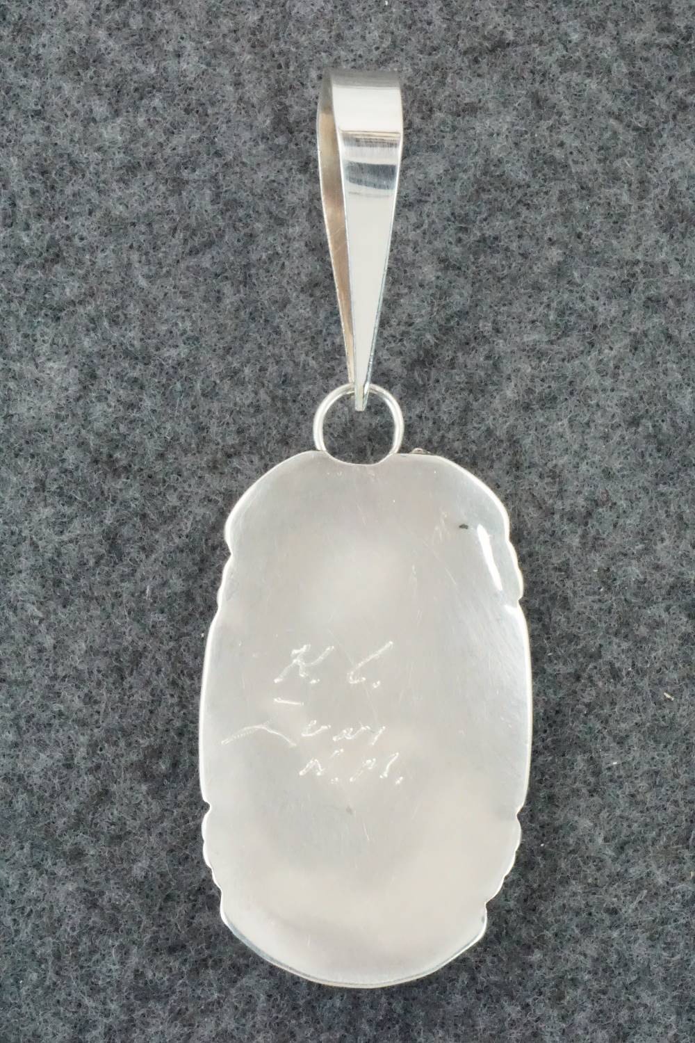 White Buffalo & Sterling Silver Pendant - Kenny Calavaza