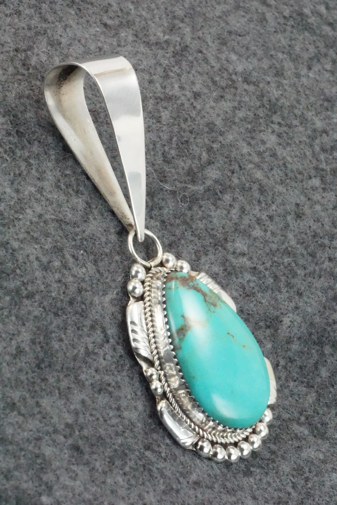 Turquoise and Sterling Silver Pendant - Kenny Calavaza