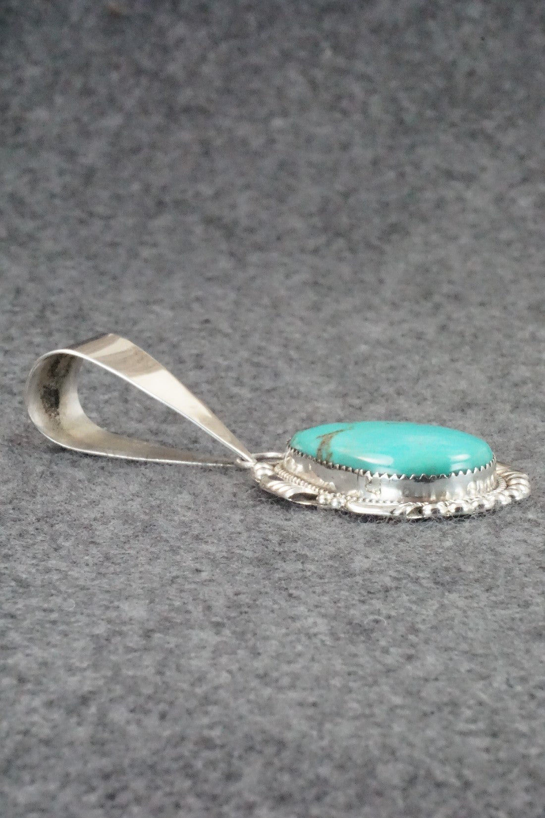 Turquoise and Sterling Silver Pendant - Kenny Calavaza