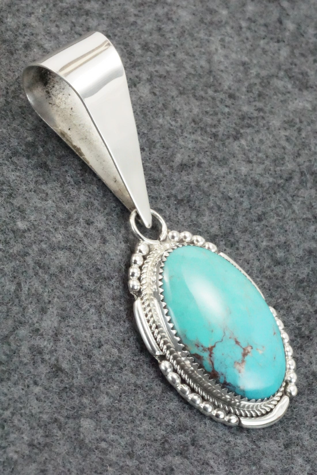 Turquoise and Sterling Silver Pendant - Kenny Calavaza