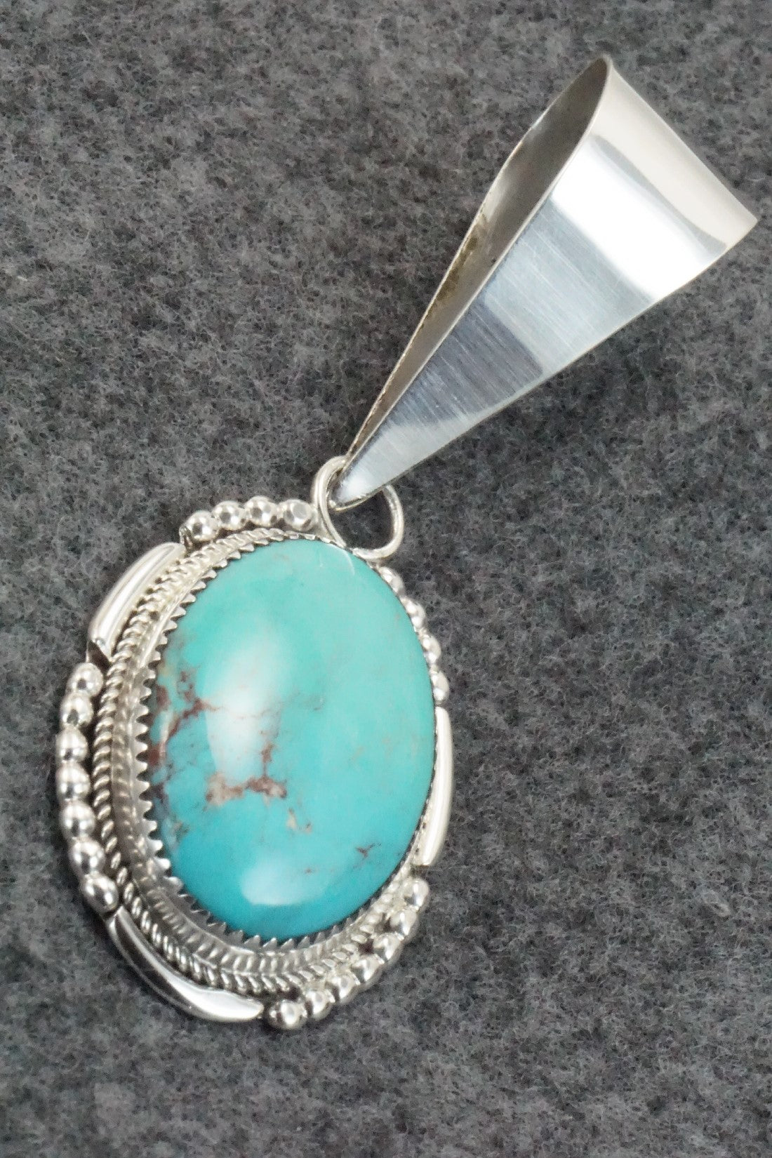 Turquoise and Sterling Silver Pendant - Kenny Calavaza