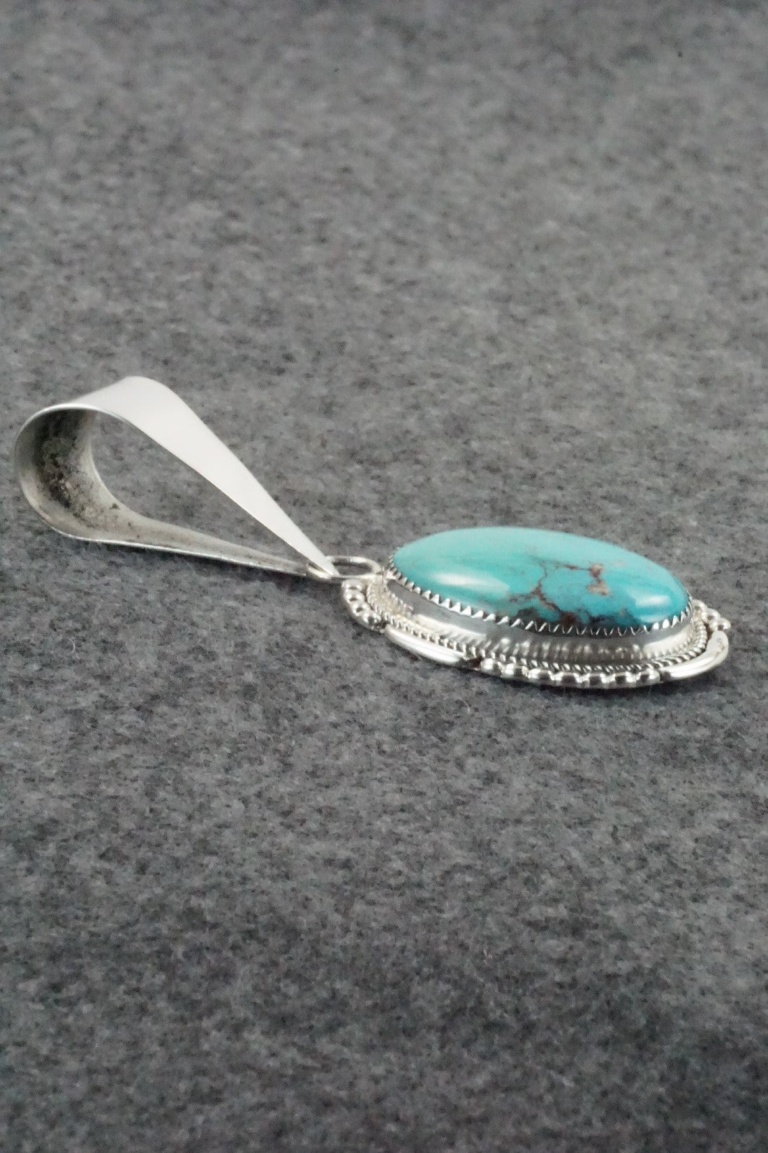 Turquoise and Sterling Silver Pendant - Kenny Calavaza