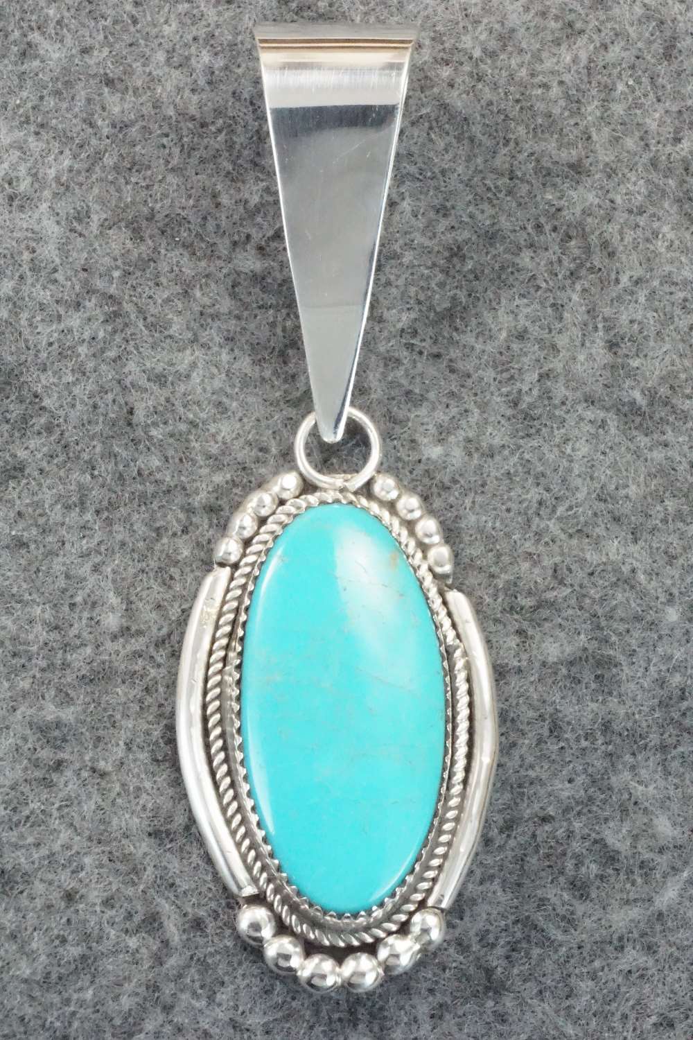 Turquoise & Sterling Silver Pendant - Kenny Calavaza