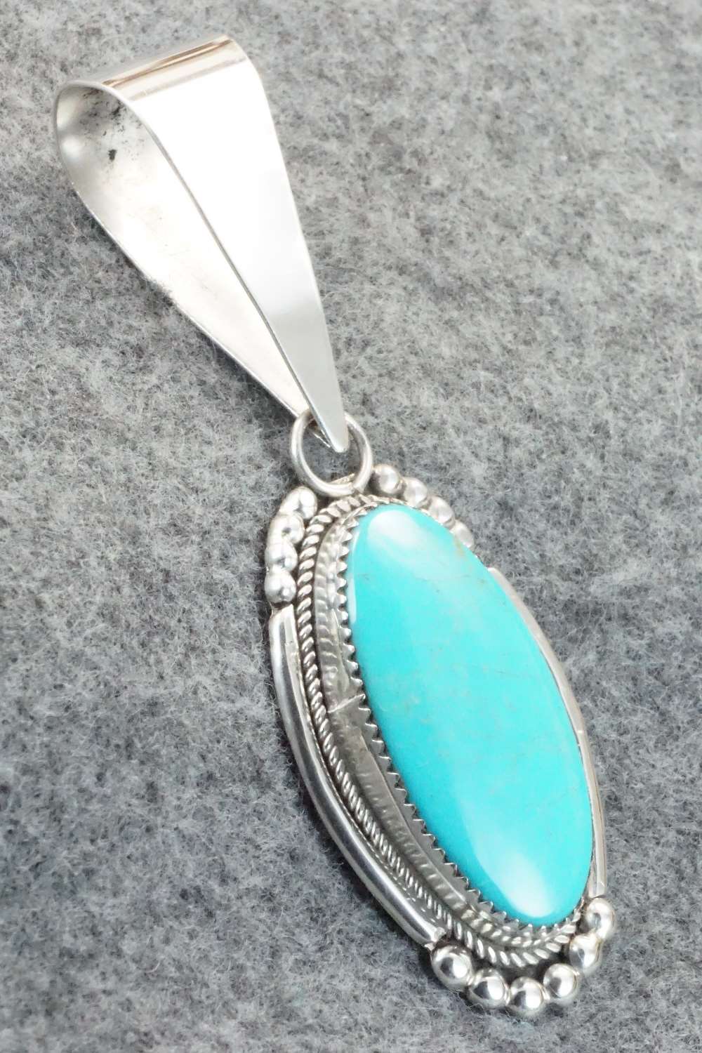 Turquoise & Sterling Silver Pendant - Kenny Calavaza