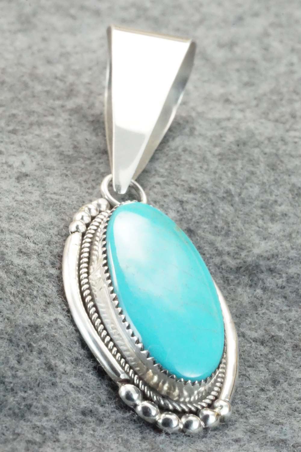 Turquoise & Sterling Silver Pendant - Kenny Calavaza