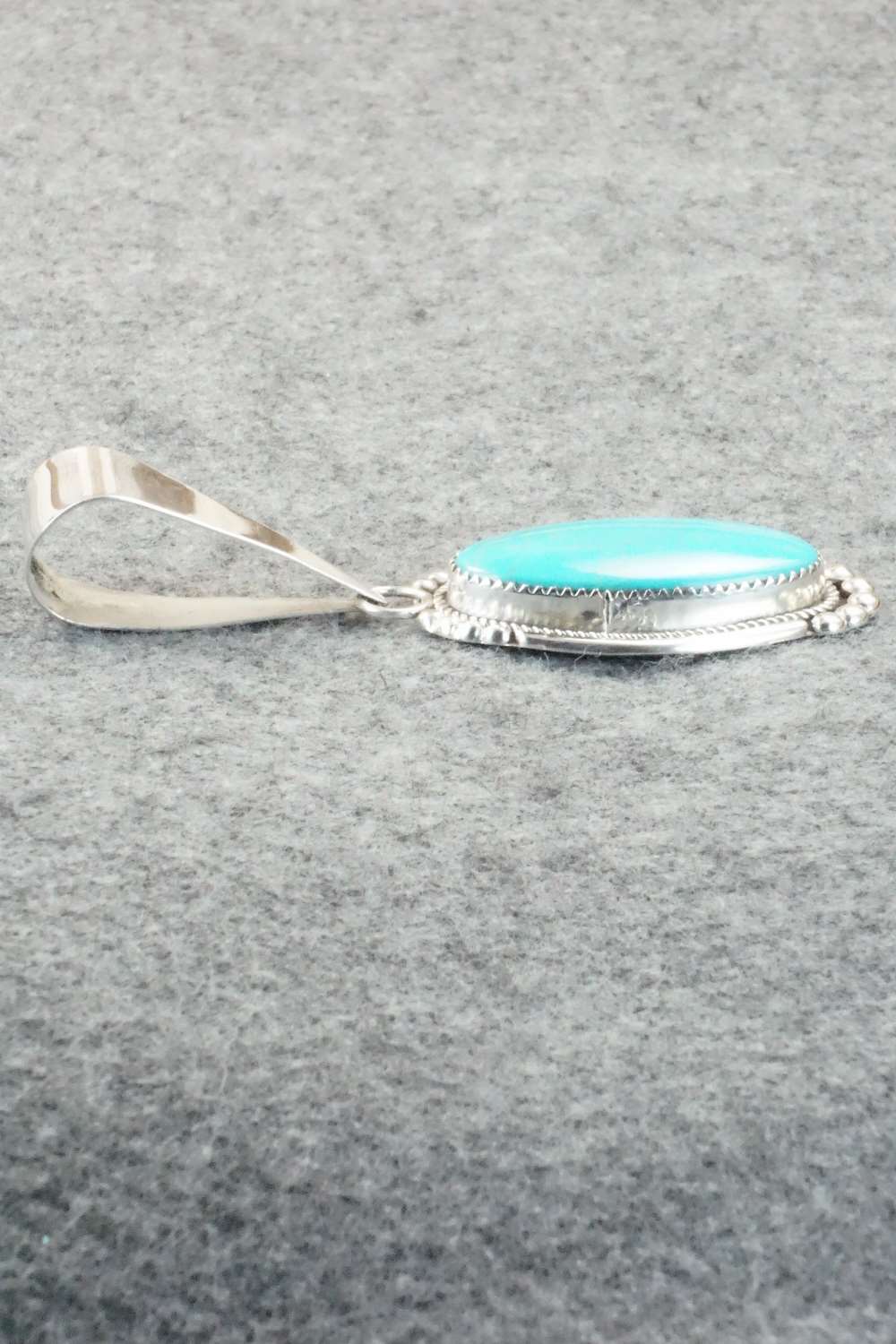 Turquoise & Sterling Silver Pendant - Kenny Calavaza