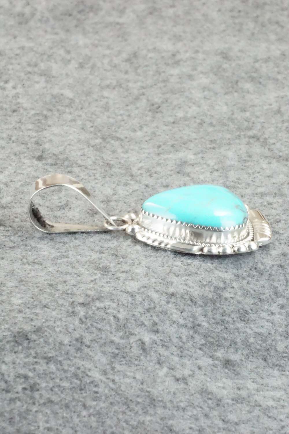 Turquoise and Sterling Silver Pendant - Kenny Calavaza
